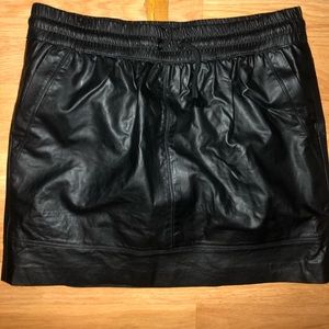 A black pleather mini skirt